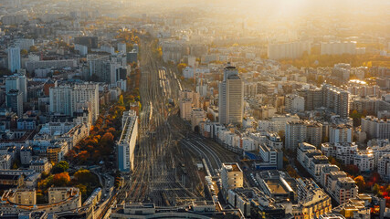 Fototapeta premium Paris view from above during a spectacular autumn sunset evening from Montparnasse Tower to Tour Eiffel - amazing color skyline