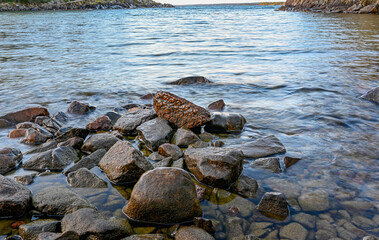 Pile of rocks in bay of lake Vattern Sweden