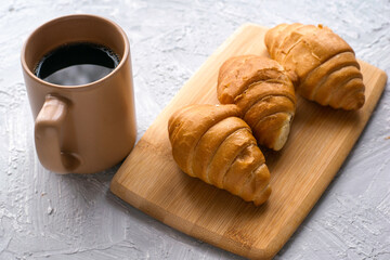 mug of coffee and croissants on the table