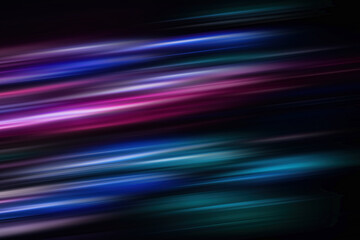 Obraz premium Abstract Rainbow light trails on the dark blue background. Motion blur illustration design.