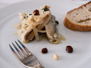 Sarde in Saor, Venetian Marinated Sardines with Onion, Raisins and Pine Nuts from Venice, Italy