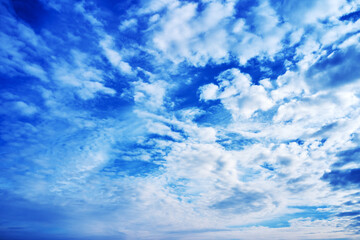 Naklejka na ściany i meble blue cloudy sky on a sunny day background screensaver backdrop