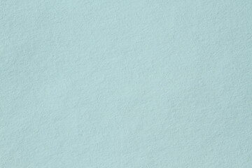 Green textured paper material for background and wall paper.  Totally blank for copy space.