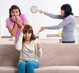 Young family and mother-in-law in family issues concept