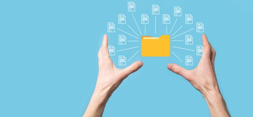 Document Management System DMS .Businessman hold folder and document icon.Software for archiving, searching and managing corporate files and information.Internet Technology Concept.Digital security.