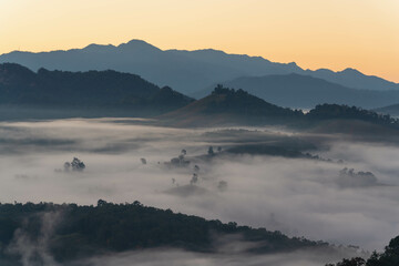 Beautiful Landscape layers of light and fog, sunrise at Mae hong son, Thailand