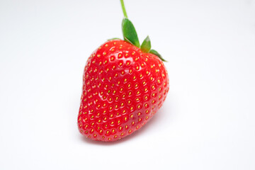 Perfect red ripe strawberry on white background
