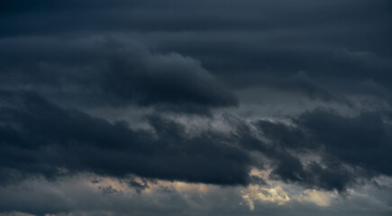 beautiful dark dramatic sky with stormy clouds before the rain or snow