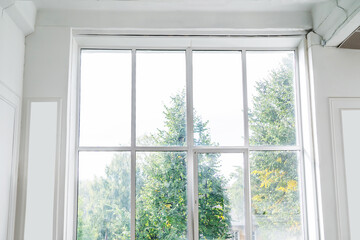 Big window. Modern glazing in a retro style in a bright room. Flat lay frame