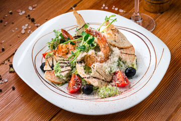 Shrimp salad ketogenic low carb low calories healthy food. Healthy salad plate with seafood and fresh vegetable