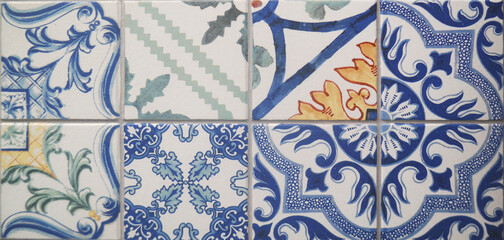 Tile texture on the wall. Decorative insert. Mosaic art. Roman style. Architectural tile insert