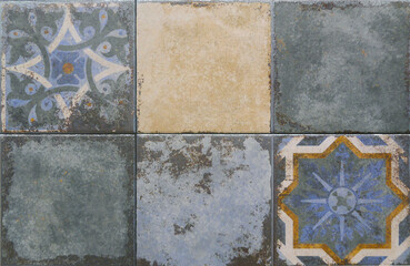 Tile texture on the wall. Decorative insert. Mosaic art. Roman style. Architectural tile insert