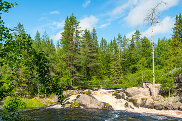 Obraz premium Ruskeala Falls. Wonderful natural park in northern Russia, Republic of Karelia. Not far from the town of Sortavala
