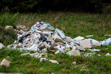 Illegal construction waste dump in nature