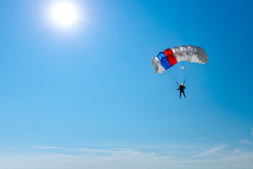 Parachute on the blue sky