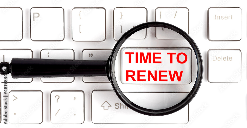 Poster time to renew written on keyboard through magnifier