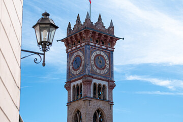 Fototapeta na wymiar Ancient bell tower with clock