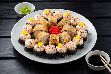 Sushi roll set in restaurant served in white plate Japan cuisine