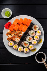 Sushi roll set in restaurant served in white plate Japan cuisine