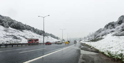 Snowy day in Istanbul, Turkey. View of highway. Beautiful winter landscape in Istanbul.