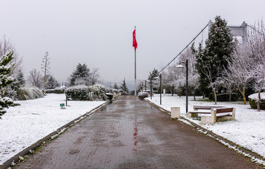 Snowy day in Istanbul, Turkey. View of Fatih Sultan Mehmet Bridge from Otagtepe. Beautiful winter landscape in Istanbul.