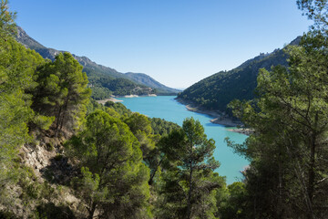 Fototapeta na wymiar beautiful turquoise mountain lake in Spain and scenic mediterranean landscape