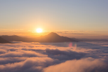 Fototapeta na wymiar Beautiful sunlight and fog at Phu Thok Mountain at Chiang Khan ,Loei Province in Thailand