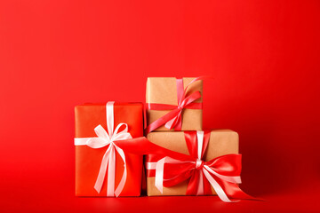 Valentine's Day gifts on color background