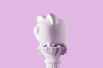 Piggy bank on antique column.