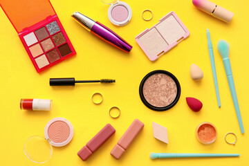 Decorative cosmetics on yellow background