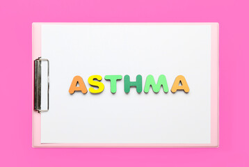 Clipboard and word ASTHMA on color background