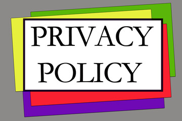 Privacy Policy text color paper on gray background.
