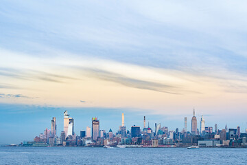 Naklejka premium New York City skyline at dusk, long exposure of Manhattan taken from Liberty State Park NJ.