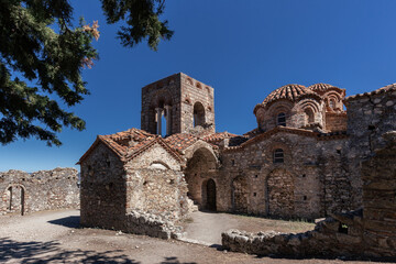 Ancient Greek Orthodox monastery ruins with stone walls, church and other buildings, Mystras, Greece