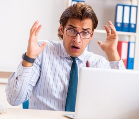The businessman disgusted with cockroaches in the office