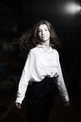 Portrait of a young beautiful long-haired girl. Vintage black and white photo.