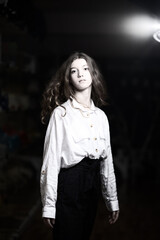 Portrait of a young beautiful long-haired girl. Vintage black and white photo.