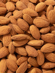 Fototapeta premium different nuts in a heap. nuts background.