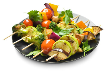 Plate with tasty vegetable skewers on white background