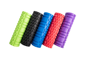 Multicolored foam rollers on white background. Gym fitness equipment. Self body care massage and...