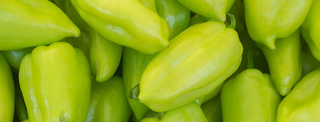 Obraz na płótnie Canvas Background texture of green fresh pepper., banner