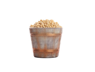 festive bucket with pine nuts isolated on white background