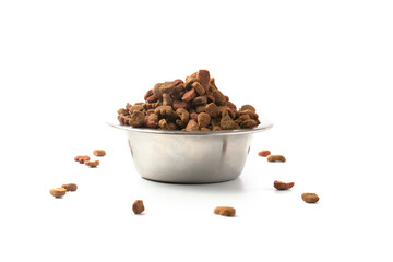 Dry cat food in an iron bowl on a white background