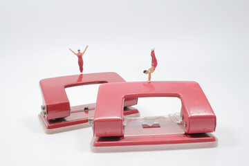 mini of fun figure man gymnasts on hole puncher