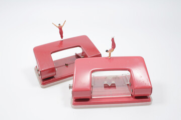 mini of fun figure man gymnasts on hole puncher