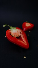 red pepper ON A BLACK BACKGROUND