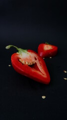 red pepper ON A BLACK BACKGROUND