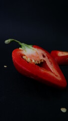 red pepper ON A BLACK BACKGROUND