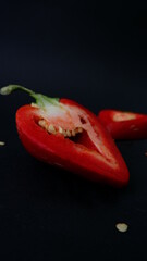 red pepper ON A BLACK BACKGROUND