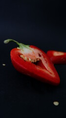 red pepper ON A BLACK BACKGROUND